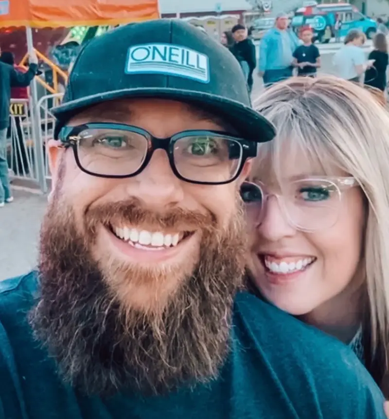 Shannon and John standing close in support during trauma recovery